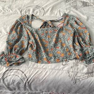 Dressy, floral, modest, cute semi formal top.